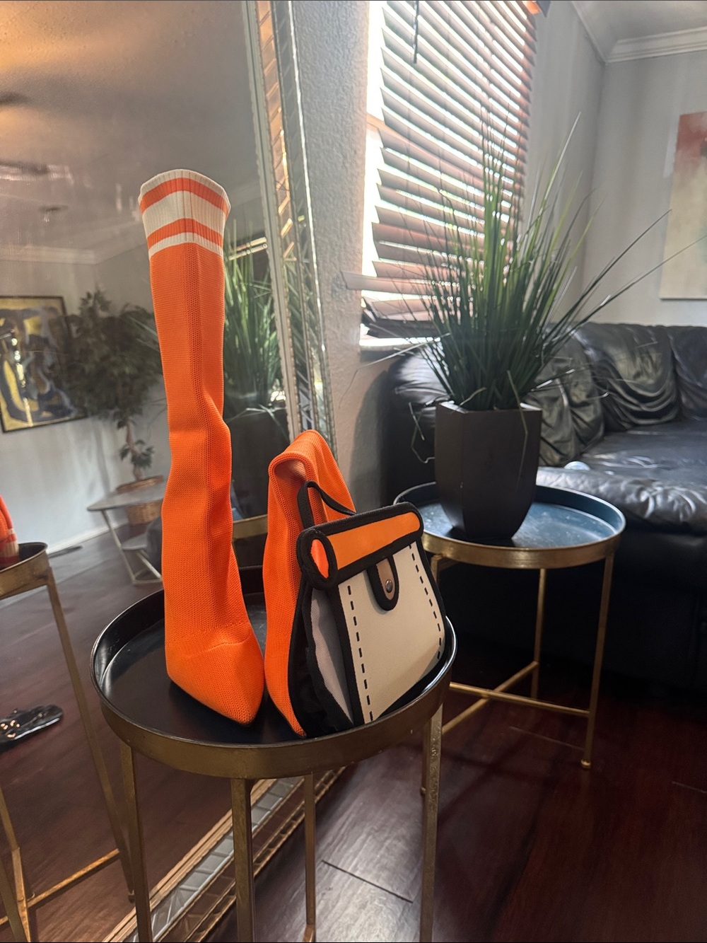 Bright Orange Knee-High Sock Boots with Matching Orange Handbag